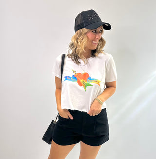 Tom Petty cropped distressed graphic tee featuring a vintage logo on soft cotton fabric with raw hem detailing