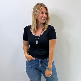 Women's fitted scoop neck short sleeve top made from soft double layer butter knit fabric in black