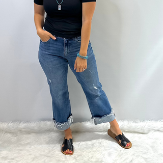 Mid-Rise slim wide-leg jean with a raw cuffed hem, light medium denim wash, relaxed structured fit by Flying Monkey