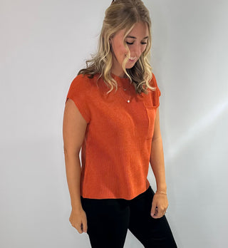 Women's round neck short sleeve knit sweater with a front chest pocket relaxed fit