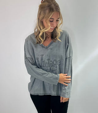 Womens Long Sleeve 100% Cotton v neck shirt with raised word "vintage" lettering on front