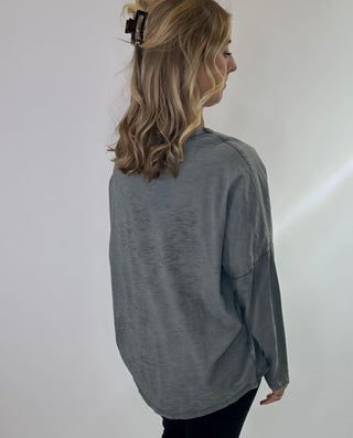 Womens Long Sleeve 100% Cotton v neck shirt with raised word "vintage" lettering on front