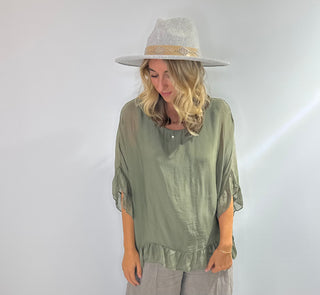 Sage Green oversized silk blouse with ruffle short sleeves, ruffle hem, and back keyhole button closure