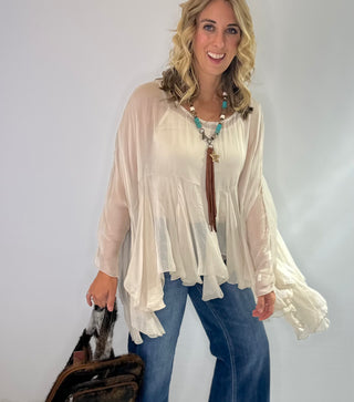 Cream Sheer silk blouse with ruffle details and lightweight fabric