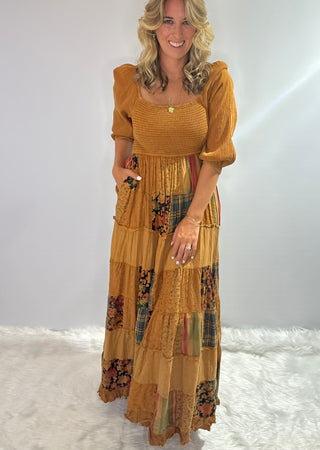 Long Golden Yellow patchwork boho dress with smocked bodice and 3/4 gathered sleeves.