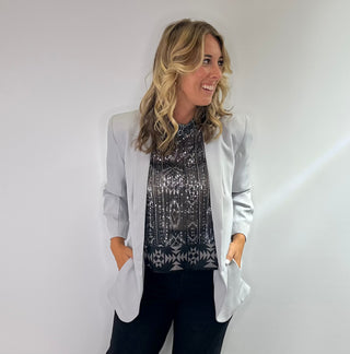 Cropped black and silver sheer tank top with sequins, diamond pattern, high neck, button back closure and side slits