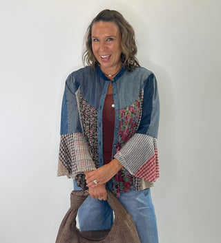 Pintucked denim button-front shirt with mixed patchwork bell sleeves and collared neckline