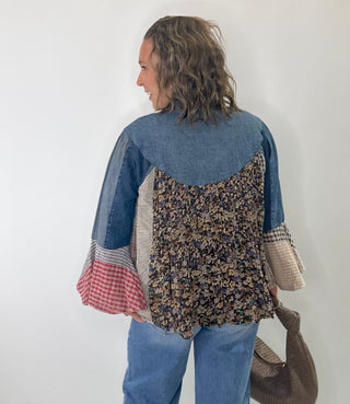 Pintucked denim button-front shirt with mixed patchwork bell sleeves and collared neckline
