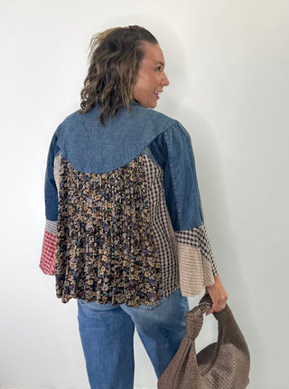 Pintucked denim button-front shirt with mixed patchwork bell sleeves and collared neckline