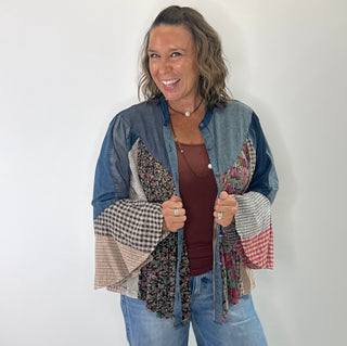 Pintucked denim button-front shirt with mixed patchwork bell sleeves and collared neckline