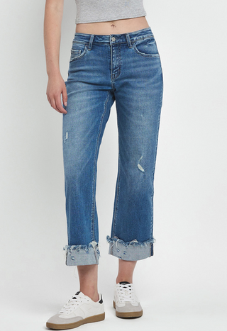 Mid-Rise slim wide-leg jean with a raw cuffed hem, light medium denim wash, relaxed structured fit by Flying Monkey