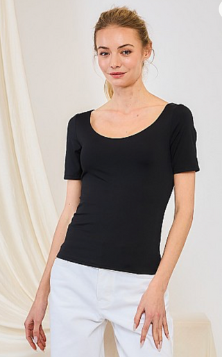 Women's fitted scoop neck short sleeve top made from soft double layer butter knit fabric in black.