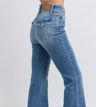 Judy Blue high-waist medium wash flare jeans with non-distressed finish and back button-close flap pockets