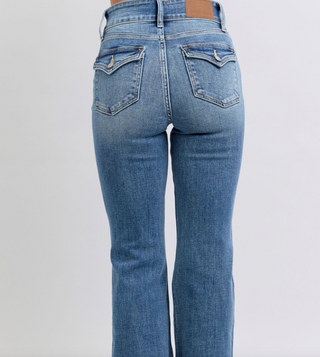 Judy Blue high-waist medium wash flare jeans with non-distressed finish and back button-close flap pockets