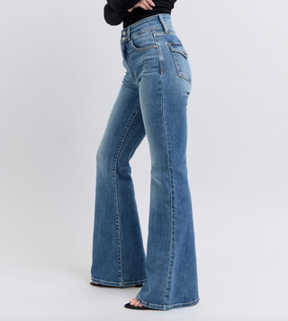 Judy Blue high-waist medium wash flare jeans with non-distressed finish and back button-close flap pockets