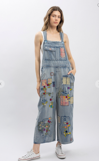 Blue Velvet Wildflower Roads Overalls in vintage-washed denim with boho embroidery, patchwork details, and oversized relaxed fit