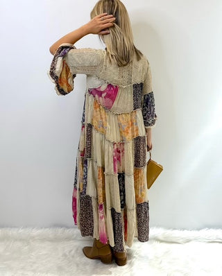 Long flowy boho dress with mixed patchwork fabric in a jhabla style silhouette, featuring relaxed fit and western inspired detailing