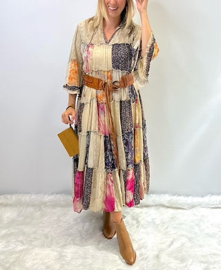 Long flowy boho dress with mixed patchwork fabric in a jhabla style silhouette, featuring relaxed fit and western inspired detailing