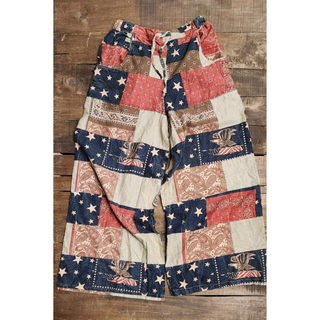 Jaded Gypsy Stars and Stripes Forever pants with vintage American flag patchwork, relaxed boho fit, and wide-leg silhouette