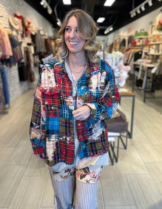 Oversized reversible patchwork flannel top with quilt inspired panels and royal zigzag stitching in multicolor fabric