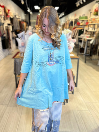 Vintage Sparrow graphic tee in turquoise with distressed tattered finish and subtle sparkle detail on 100% cotton
