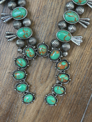 Chunky Turquoise Horseshoe Squash Blossom Drop Necklace in Mixed Metals