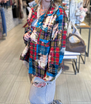 Oversized reversible patchwork flannel top with quilt inspired panels and royal zigzag stitching in multicolor fabric