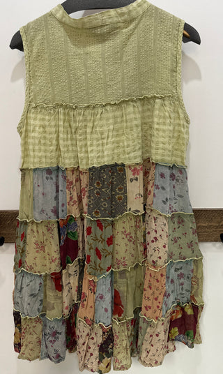 Patchwork tiered sleeveless jhabla tunic top with V neckline, relaxed fit, and hip length boho silhouette