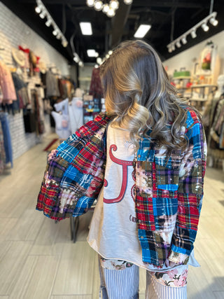 Oversized reversible patchwork flannel top with quilt inspired panels and royal zigzag stitching in multicolor fabric