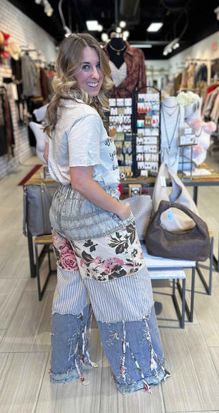 Vintage inspired patchwork chambray wide leg pants with tiered panels, rose prints, stripes and crochet detailing a quilted boho design. 