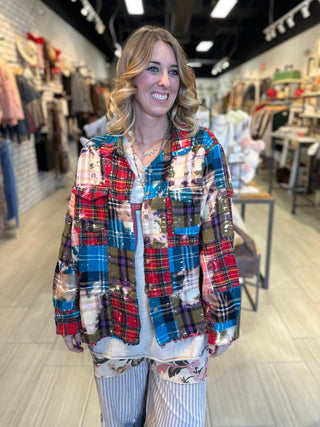 Oversized reversible patchwork flannel top with quilt inspired panels and royal zigzag stitching in multicolor fabric