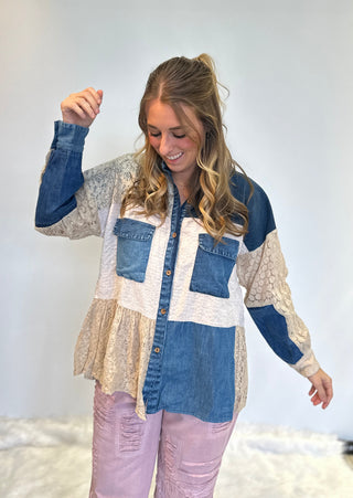 Mixed media denim shirt with lace patchwork, button-up front, long sleeves, and relaxed boho shirt-jacket fit.