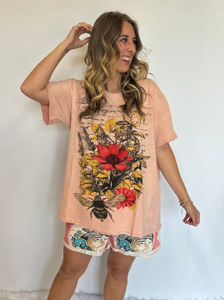 Jaded Gypsy Moon Dance Honey Blossom graphic tee with vintage-inspired floral design, soft cotton fabric, and relaxed boho fit
