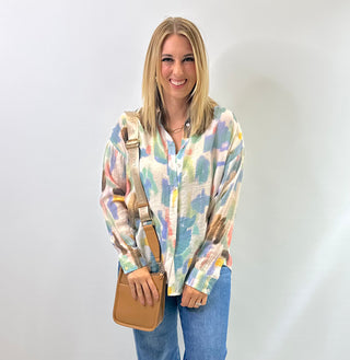 Womens long sleeve collared blouse with watercolor print, button front closure and a relaxed fit, the perfect blouse