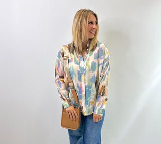 Womens long sleeve collared blouse with watercolor print, button front closure and a relaxed fit, the perfect blouse