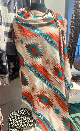 Aztec Western stripe poncho top with side and shoulder button details in cream, beige, turquoise and rust