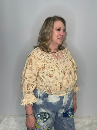 Jaded Gypsy Forever Bloom | Artisanal Floral Crochet Blouse in Premium Cotton Floral blouse with lace neckline on a wooden surface