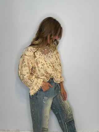 Jaded Gypsy Forever Bloom | Artisanal Floral Crochet Blouse in Premium Cotton Floral blouse with lace neckline on a wooden surface