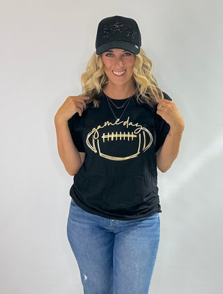 Black graphic t shirt with gold football and cursive game day design, perfect for team spirit and fanwear