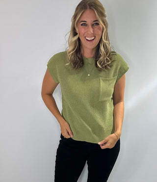 Women's round neck short sleeve knit sweater with a front chest pocket relaxed fit. 
