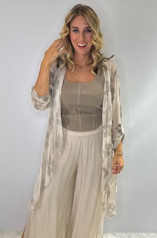 Sheer floral silk duster in beige and taupe with 3/4 length button up sleeves 