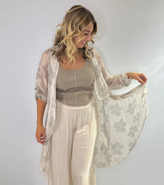 Sheer floral silk duster in beige and taupe with 3/4 length button up sleeves 