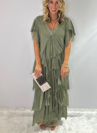 Long, tiered sage green silk maxi dress with v neckline, ruffled accents and sequin embellishments