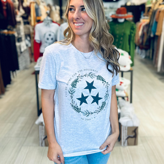 I'll Be Home for the Holidays Heather Grey graphic tee with 3 stars and Nashville Coordinates