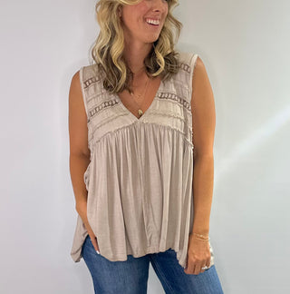 Womens loose fit V-neck babydoll knit top in Taupe or soft pink, casual, lightweight fabric with flowy silhouette