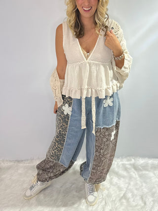 Pol Sleeveless V-Neck baby doll mini top with ruffle detail in thermal and double gauze fabric