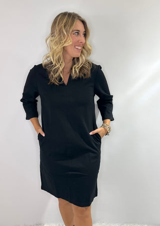 Black A-line dress with mandarin collar, v-neck, 3/4 sleeves, and side pockets boutique style