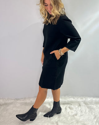 Black A-line dress with mandarin collar, v-neck, 3/4 sleeves, and side pockets boutique style