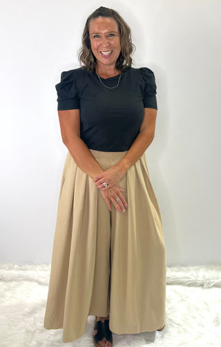 High waisted relaxed fit wide leg trousers with pleated front and elastic waistband
