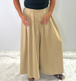 High waisted relaxed fit wide leg trousers with pleated front and elastic waistband